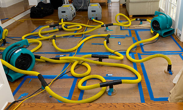 Professional Flood Damage Restoration technician working in Pocasset, OK